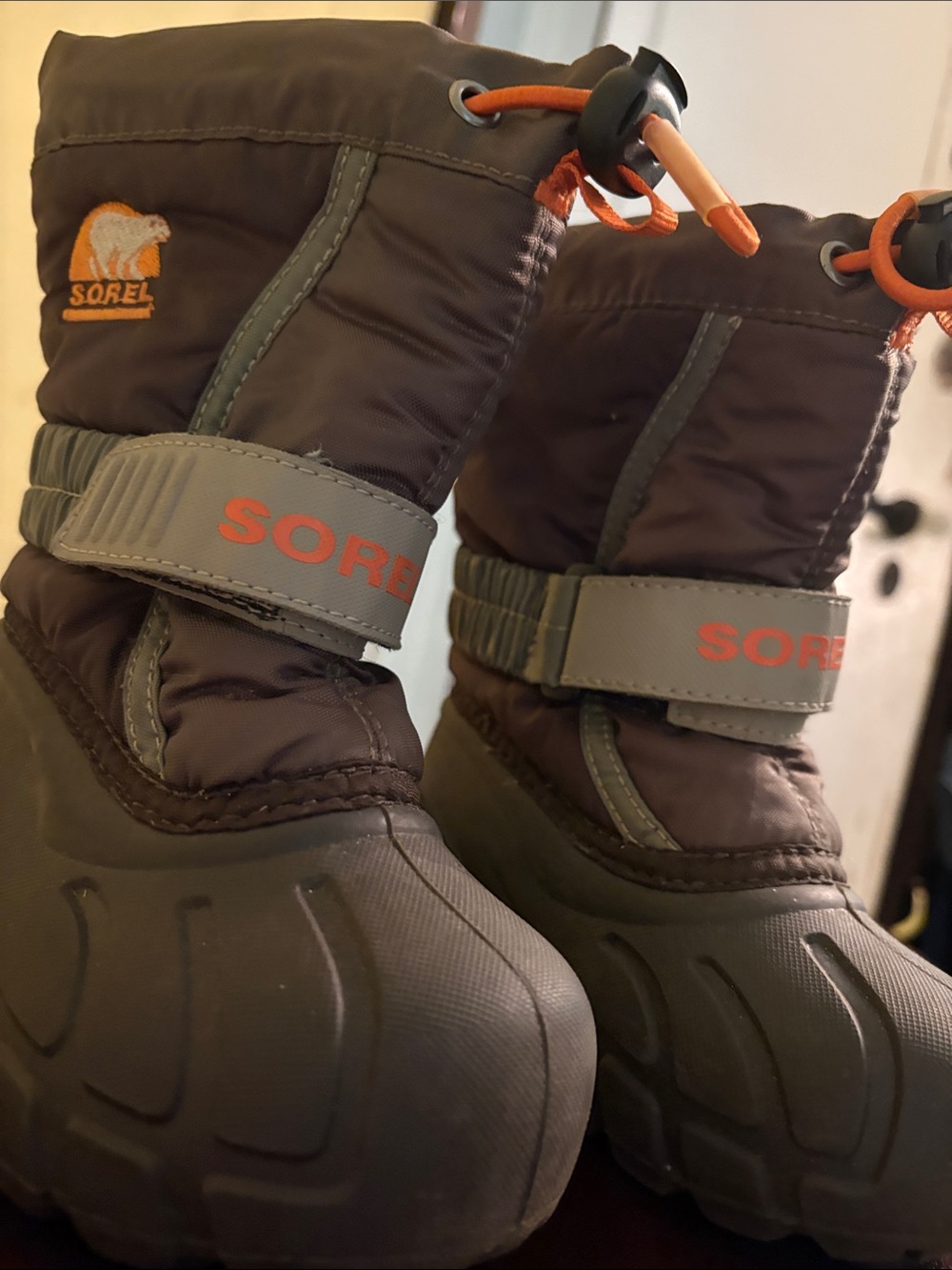 Sorel Brown Kids Winter Boots with Orange Accents